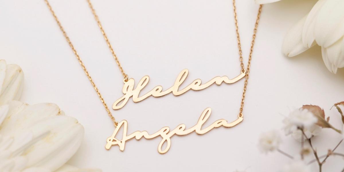 Gold nameplate necklaces with Helen and Angela on a floral background